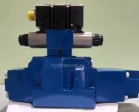 4WRZE25EA325-7X/6EG24ETK31/A1M - Пропорциональный распределитель  Ду25 со встроенным усилителем (OBE), номинальный расход 325 л/мин, схема EA, каналы управления ET - X и Y - внутренние, сигнал управления ± 10 В